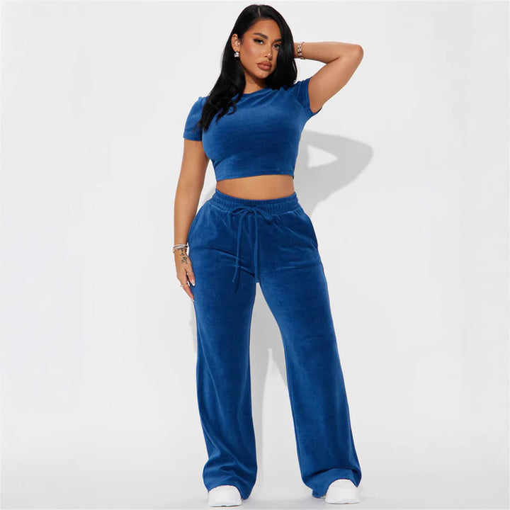 Damen Velours-Hausanzug mit bauchfreiem Shirt und weit geschnittener taillenhoher Jogginghose Drune
