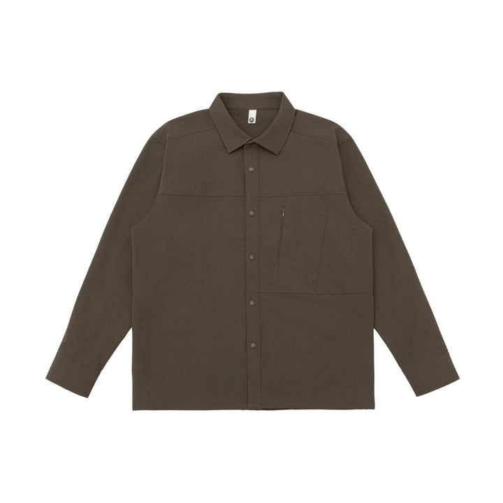 Unisex Oversize-Hemdjacke im Utility‑Style mit verdeckter Druckknopfleiste und diagonaler Reißverschlusstasche Drune