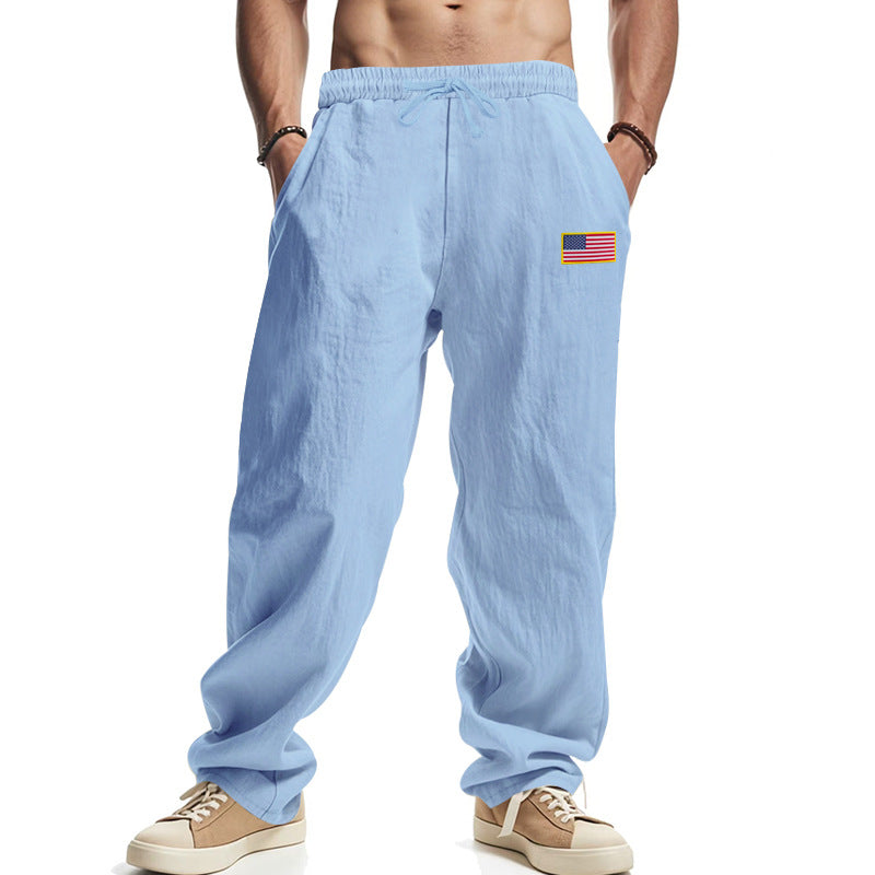 Herren nan lockere Baumwoll-Leinen Freizeithose mit elastischem Bund Kordelzug und dezenter Flaggen-Applikation Drune