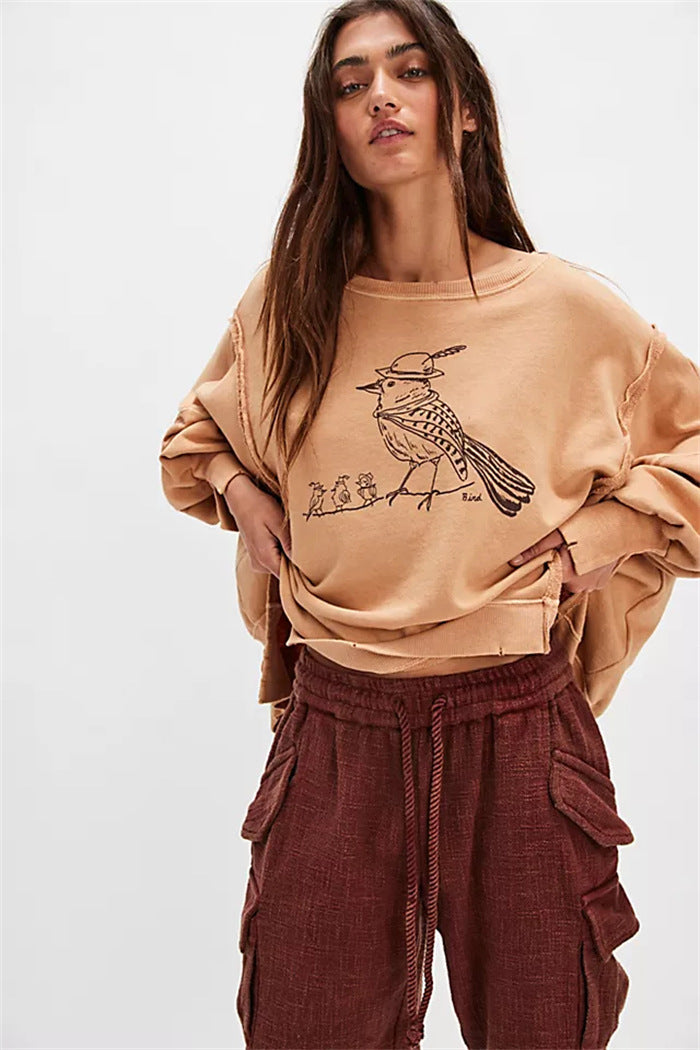 Damen oversized Sweatshirt mit Rüben-Print, ausgefransten Nahtakzenten und Daumenlochärmeln Drune