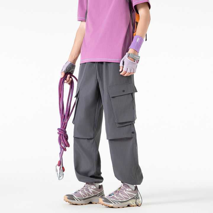 Herren Baggy‑Cargohose im Tech‑Utility‑Stil mit elastischem Tunnelzugbund, großen Klappfächern und Zipper‑Details Drune