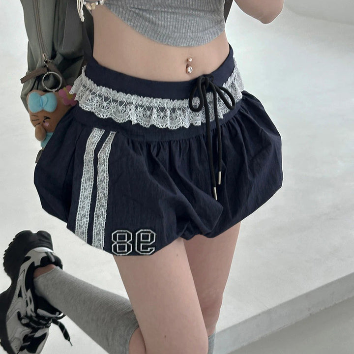 Damen sportliche Shorts mit Spitzenakzenten und elastischem Bund Drune