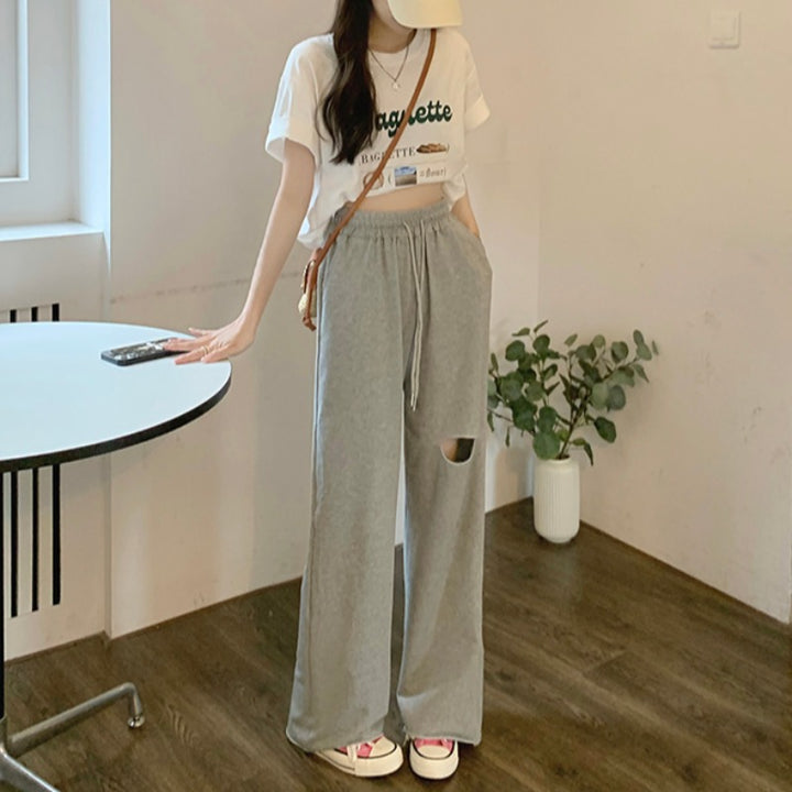 Damen lässige weit geschnittene Sweatpants mit modischem Cut-Out und elastischem Bund