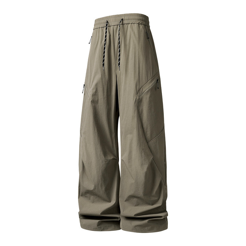 Herren Oversize-Utility-Cargo-Hose aus leichtem Nylon mit elastischem Kordbund, seitlichen Reißverschlusstaschen & weiter Ballon-Silhouette Drune