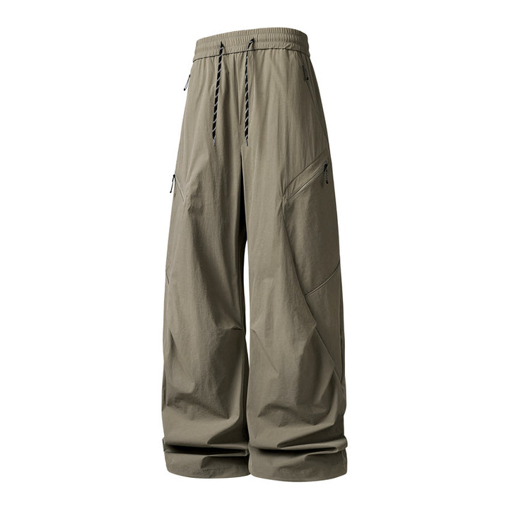 Herren Oversize-Utility-Cargo-Hose aus leichtem Nylon mit elastischem Kordbund, seitlichen Reißverschlusstaschen & weiter Ballon-Silhouette Drune