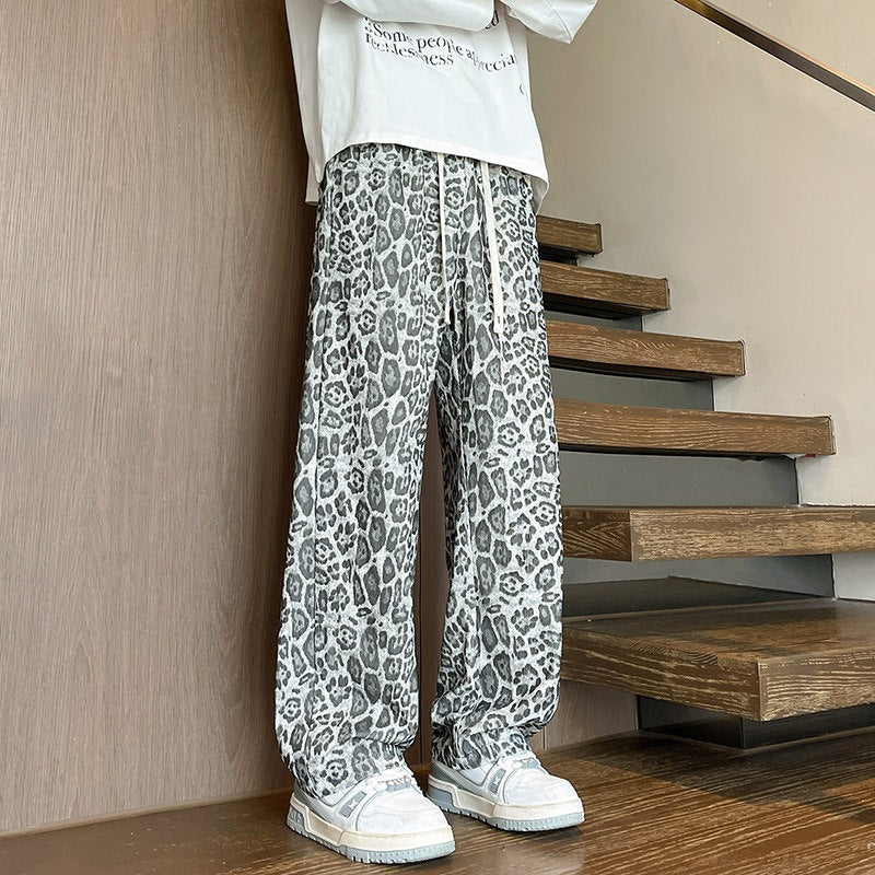 Herren Weit geschnittene Leoprint-Hose aus leichtem Viskose-Mix mit Kordelzug Drune
