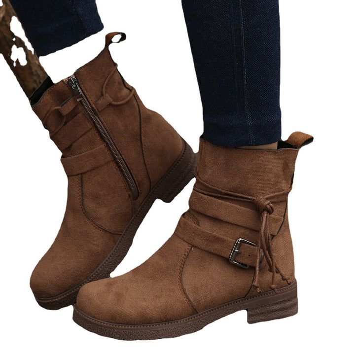 Damen nan Kurzstiefelette aus Veloursoptik mit seitlichem Reißverschluss, dekorativem Wickelriemen und robust profilierter Sohle Drune