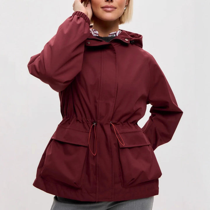 Damen wasserdichte Parka-Jacke mit Kapuze, Tunnelzugtaillierung und XXL-Klappentaschen Drune