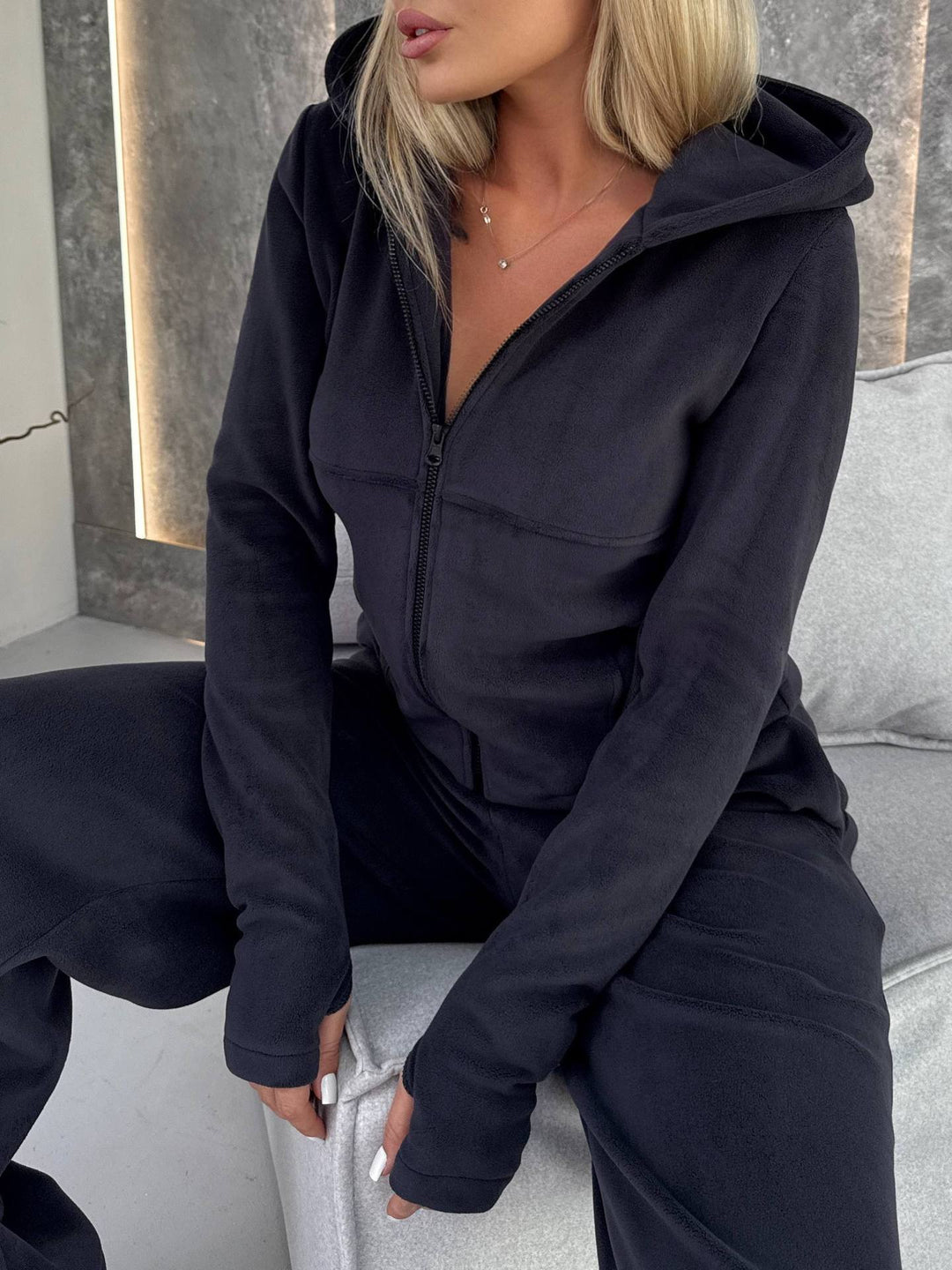 Damen Fleece-Jumpsuit mit hohem Kragen und praktischen Taschen Drune