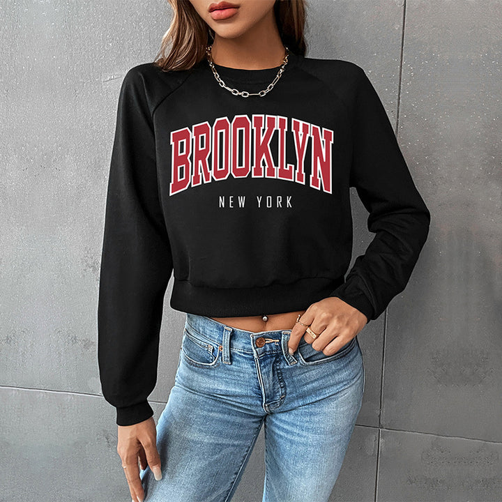 Damen Cropped College-Sweatshirt mit Rundhalsausschnitt, Raglanärmeln und Brooklyn-Print Drune