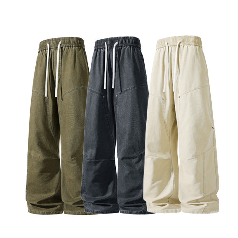 Herren weite Baggy-Cargohose aus gewaschenem Canvas mit Elastikbund und dekorativen Nahtpaneelen Drune
