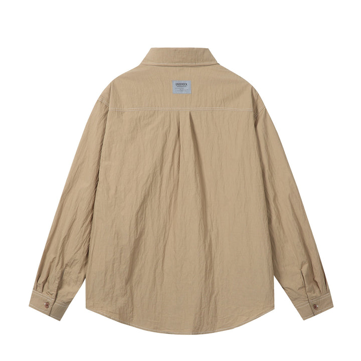 Unisex Oversize-Hemdjacke mit markanten Kontrastnähten und aufgesetzten Brusttaschen Drune