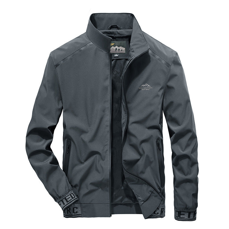 Herren Softshelljacke mit reflektierenden Einsätzen, wasserabweisenden Reißverschlusstaschen und hohem Stehkragen Drune