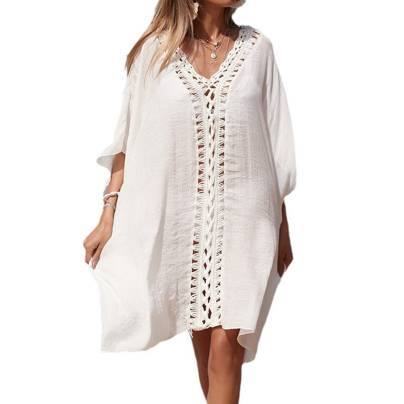 Damen eleganter Strandponcho mit raffinierten Häkelakzenten und tiefem V-Ausschnitt Drune