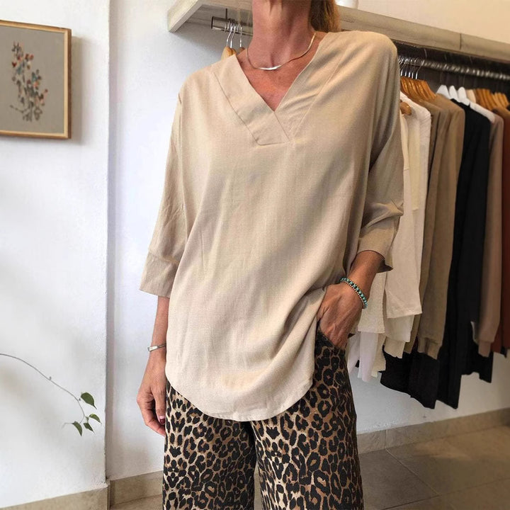 Damen lässiges V-Ausschnitt Shirt mit weiten Ärmeln Drune
