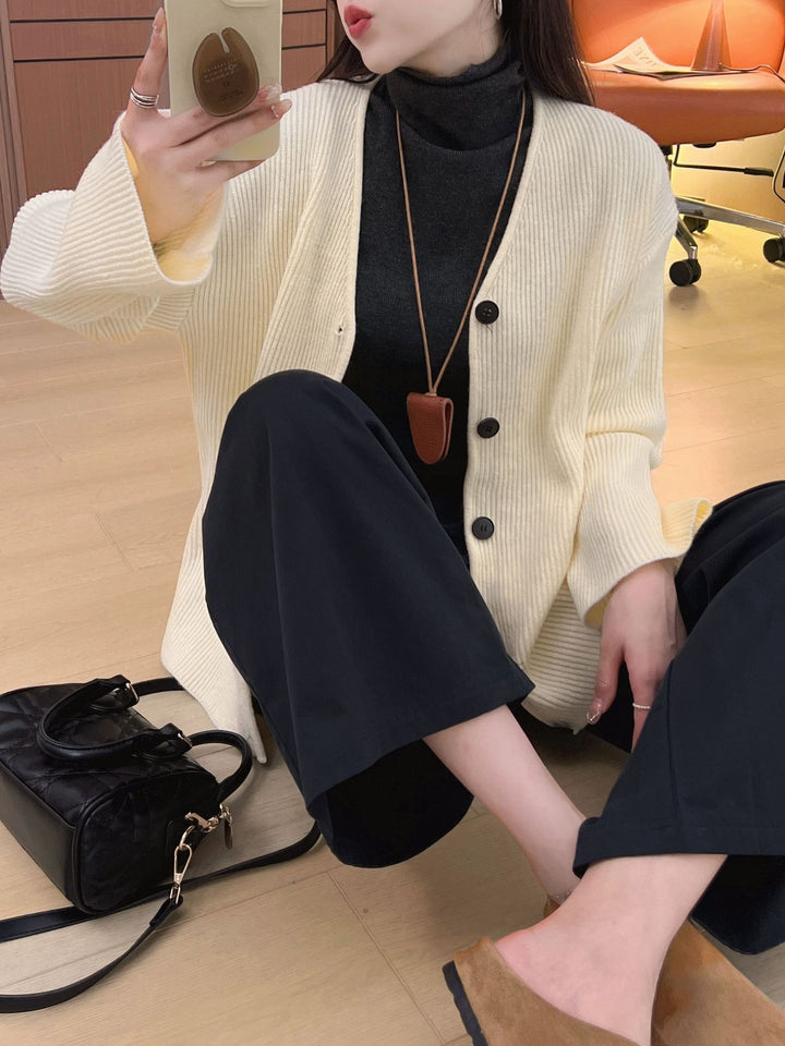 Damen lässiger Strickcardigan mit tiefem V-Ausschnitt und Knopfverschluss Drune