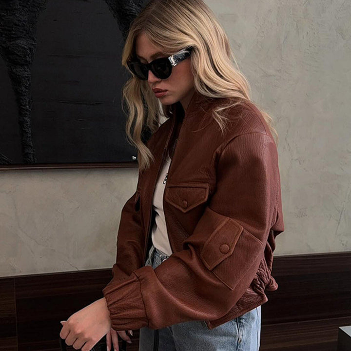 Damen Modische Kunstlederjacke mit einzigartigen Taschen und elastischen Rippabschlüssen Drune