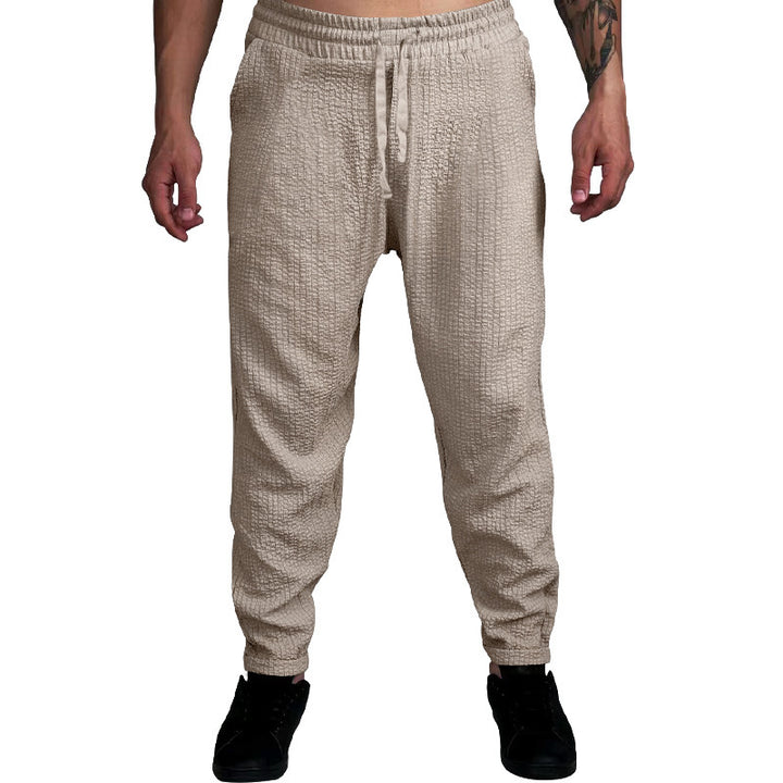 Herren Texturierte tapered Jogginghose mit Elastikbund, Tunnelzug & gerippten Knöchelbündchen Drune