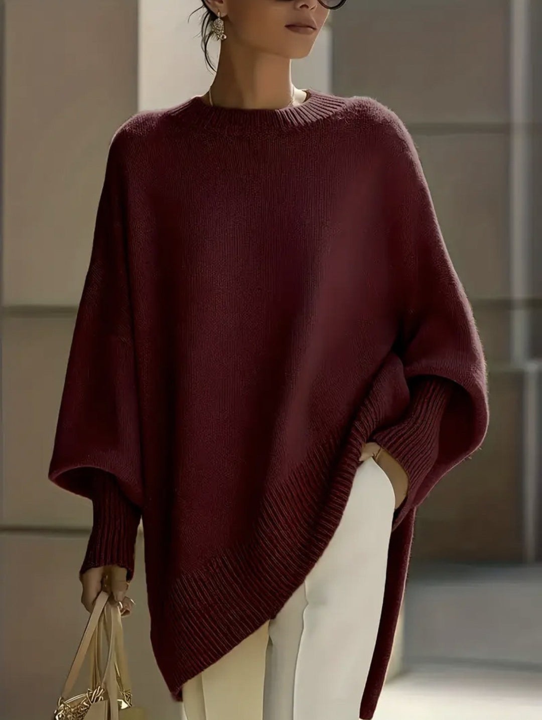 Damen nan Oversize Strickponcho mit asymmetrischem Saum und gerippten Ärmeln Drune