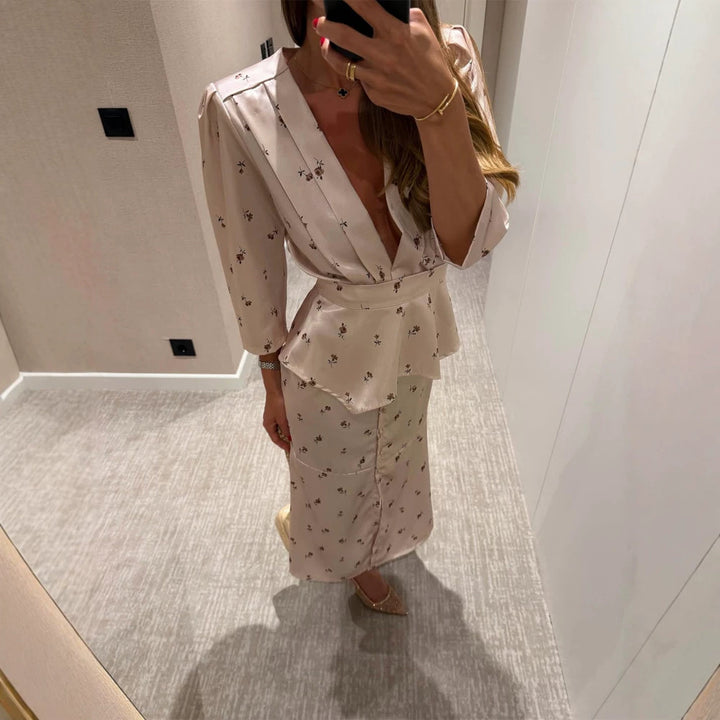 Damen Satin-Zweiteiler mit tailliertem Peplum-Top, tiefem V-Ausschnitt und knöpfbarem Midirock Drune