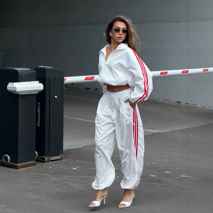 Damen Oversized kurz geschnittene Trainingsjacke und taillenhohe Jogginghose Set mit Seitenstreifen Drune