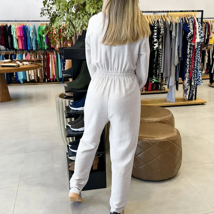 Damen Stilvoller Jumpsuit mit Wickeldesign und Taillengürtel Drune