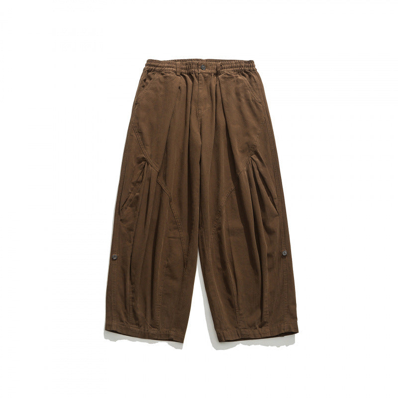 Unisex Weite Plissee-Culottehose mit elastischem Bund, tiefen Eingrifftaschen und legerer 3/4‑Länge Drune