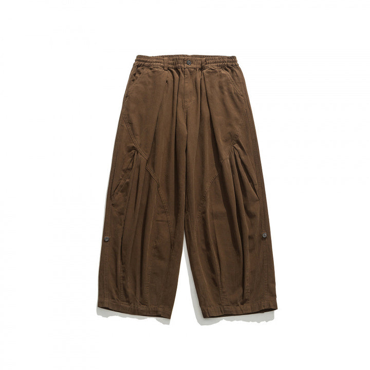 Unisex Weite Plissee-Culottehose mit elastischem Bund, tiefen Eingrifftaschen und legerer 3/4‑Länge Drune