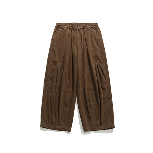 Unisex Weite Plissee-Culottehose mit elastischem Bund, tiefen Eingrifftaschen und legerer 3/4‑Länge Drune