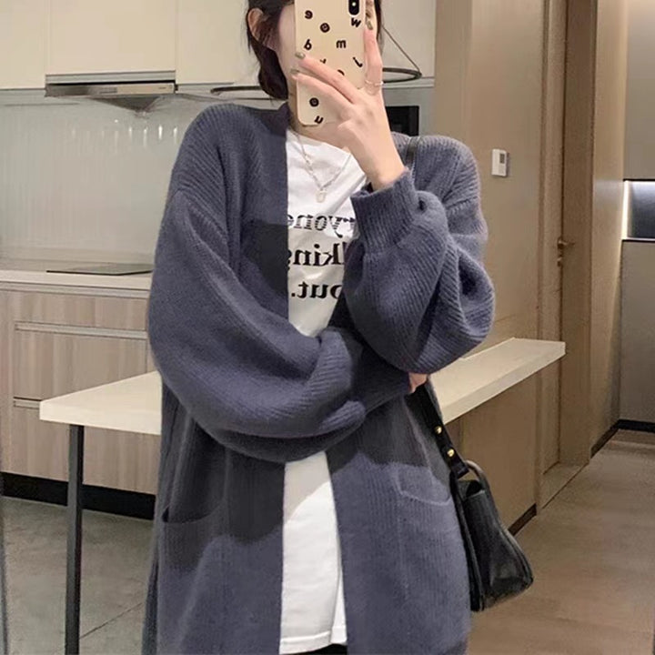 Damen Langer Strickcardigan mit praktischen Taschen und eleganter Silhouette Drune