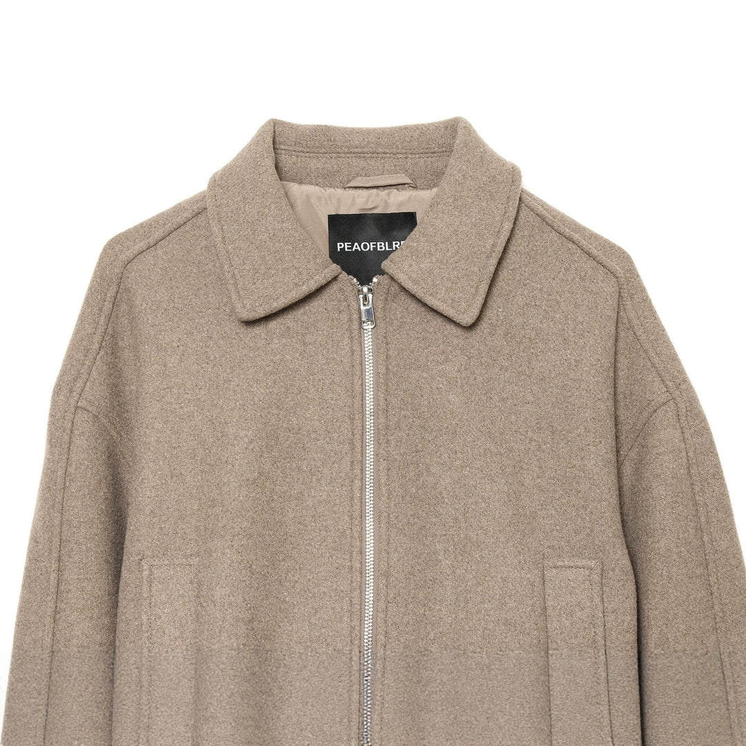 Damen nan kurze Wolljacke mit durchgehendem Reißverschluss, Umlegekragen und Kordelzugsaum Drune