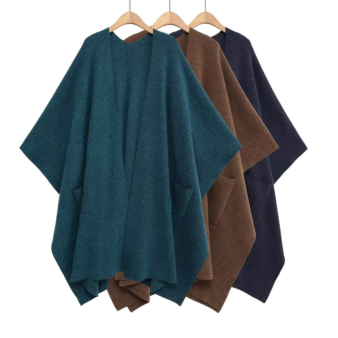 Damen Oversize Strickponcho mit Eingrifftaschen und asymmetrischem Saum Drune