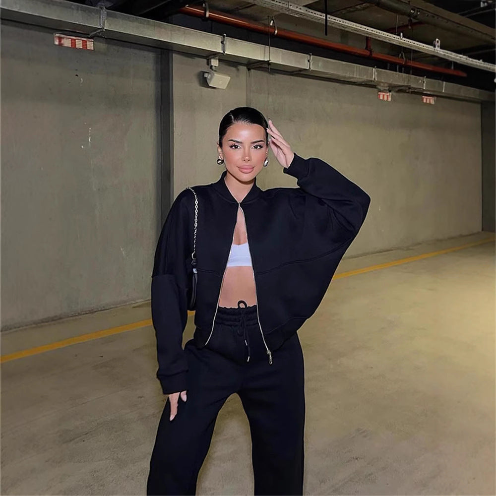 Damen sportive Oversize-Fleecejacke mit diagonaler Reißverschluss-Optik und weit geschnittener High-Waist-Jogginghose Drune
