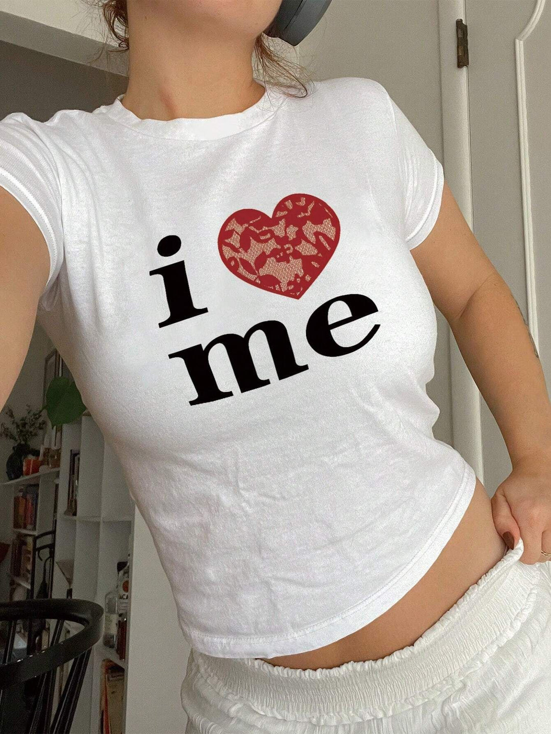 Damen T-Shirt mit funkelndem Discokugel-Motiv und zeitgemäßem Schleifendetail Drune