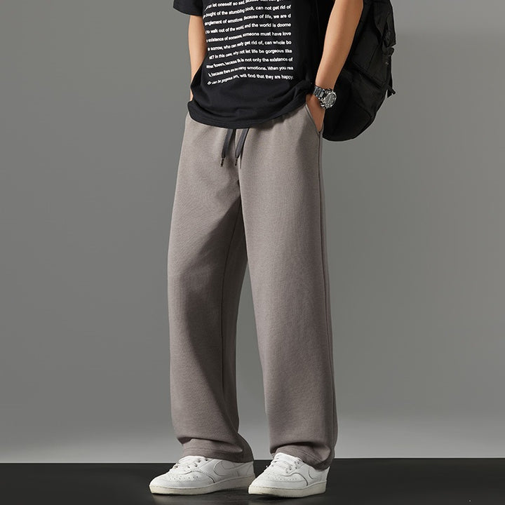 Herren weite Relaxed-Jogginghose aus French-Terry mit Kordelzug, elastischem Bund & geradem Bein Drune