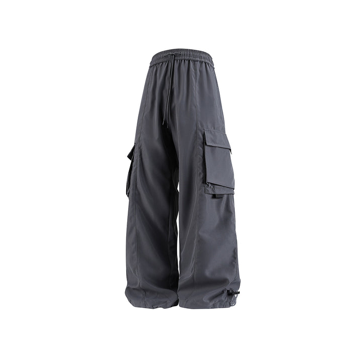 Herren weite Utility‑Cargohose im Baggy‑Cut mit Tunnelzugbund, großen Klappentaschen und verstellbarem Beinabschluss Drune