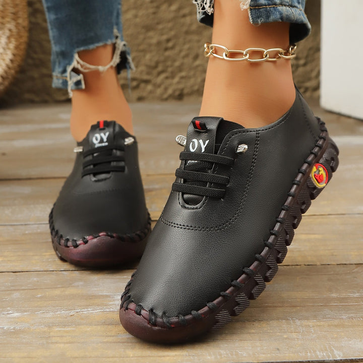 Damen Bequeme Lederoptik-Slipper mit flexibler Profilsohle und Mokassin-Naht Drune