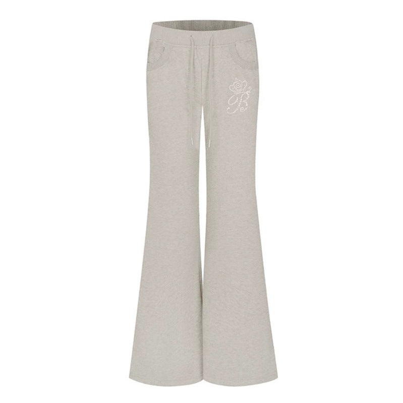Damen Ausgestellte Loungehose mit hohem Komfortbund, Kordelzug und Strass‑Logo Drune