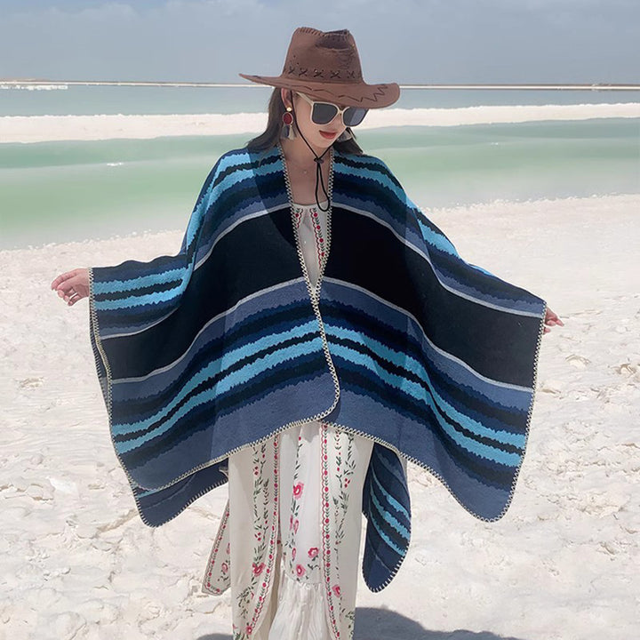 Damen Oversize-Strickponcho mit mehrfarbigem Wellenstreifen und Zierkordkante Drune