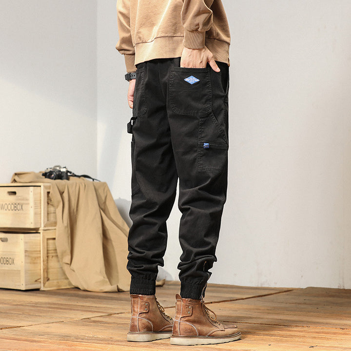 Herren Cargo-Jogginghose im Utility-Look mit elastischem Tunnelzugbund und verstärkten Pattentaschen Drune