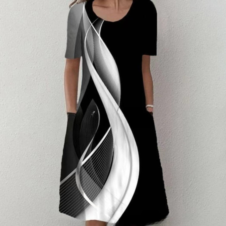 Damen Plissee Midi Kleid mit kurzen Ärmeln, seitlichen Taschen und floralem Saum Drune