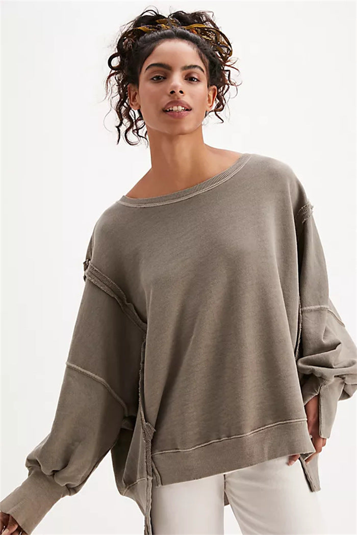 Damen oversized Sweatshirt mit Ballonärmeln, offenen Saumnähten und seitlichen Schlitzen Drune