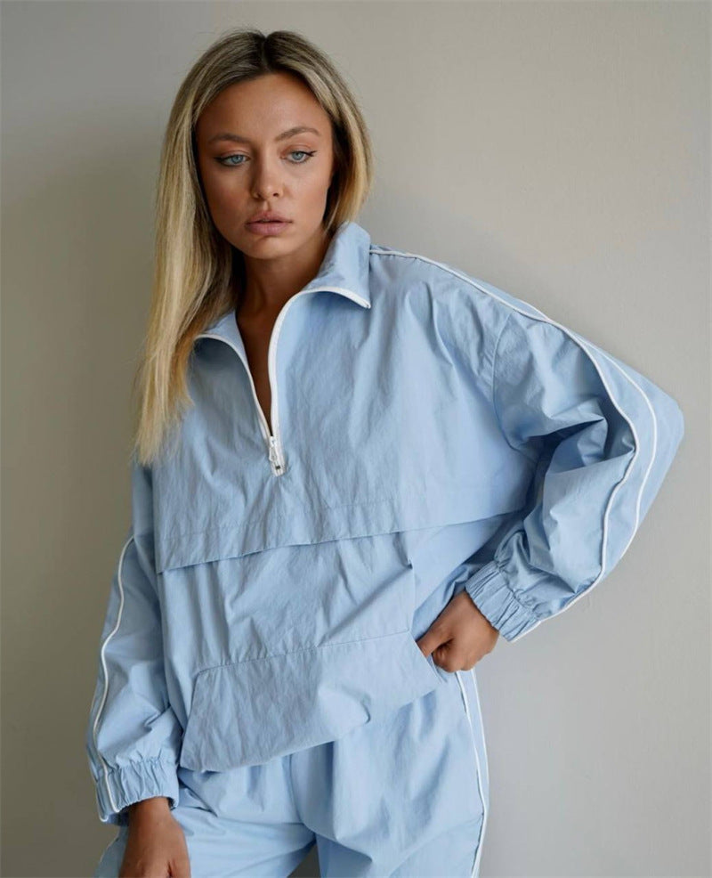 Damen Oversized Windjacke Halbzip-Anorak mit Kängurutasche und Paspelierung Drune