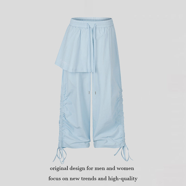 Damen Weite Capri-Hose mit Tunnelzug, seitlicher Raffung und asymmetrischer Überlagerung Drune