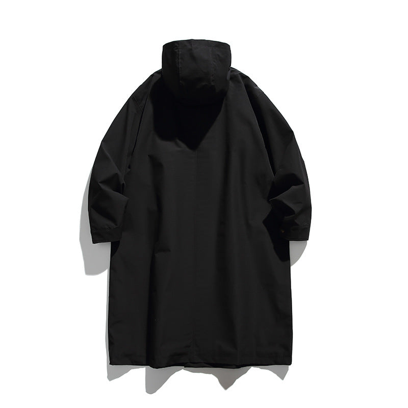 Unisex Langer Kapuzenmantel im Boxy‑Cut mit verdeckter Knopfleiste und großen Pattentaschen Drune