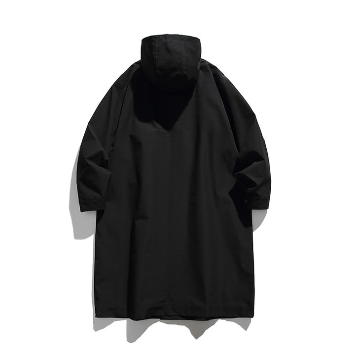 Unisex Langer Kapuzenmantel im Boxy‑Cut mit verdeckter Knopfleiste und großen Pattentaschen Drune