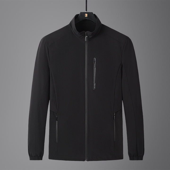 Herren Leichte Softshell-Jacke mit Stehkragen, wind- und wasserabweisender Oberfläche sowie Reißverschlusstaschen Drune