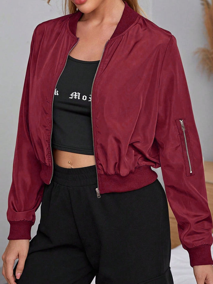 Damen Cropped Bomberjacke aus Satinoptik mit Ärmeltasche und elastischem Saum Drune