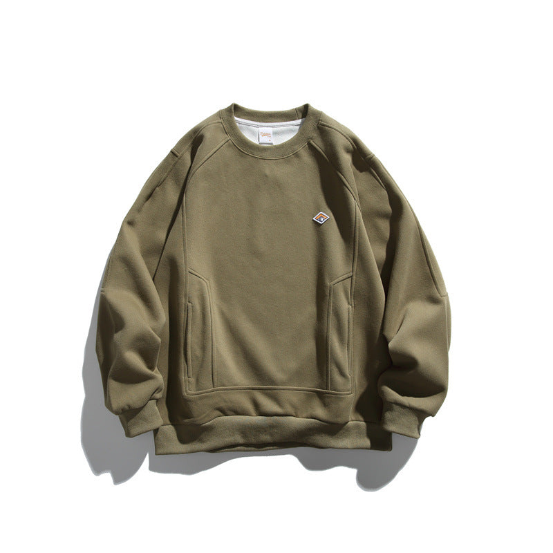 Unisex Oversize-Sweatshirt aus French-Terry mit Raglanärmeln, verdeckten Eingrifftaschen und kleinem Logopatch Drune