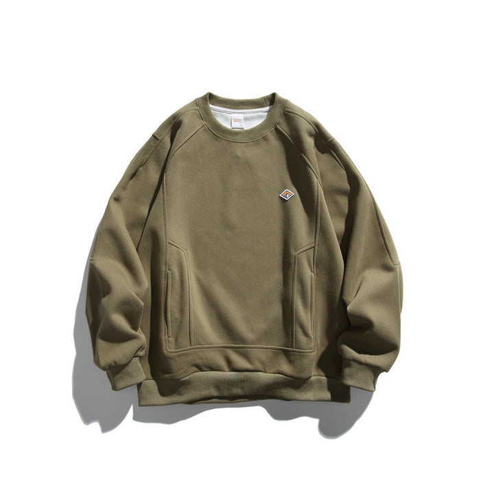 Unisex Oversize-Sweatshirt aus French-Terry mit Raglanärmeln, verdeckten Eingrifftaschen und kleinem Logopatch Drune